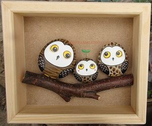 Cuadros hechos con piedras-buhos